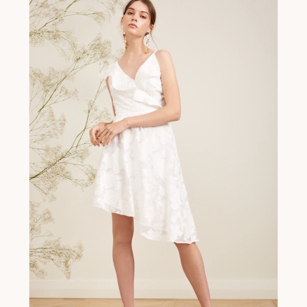 White knee length dress